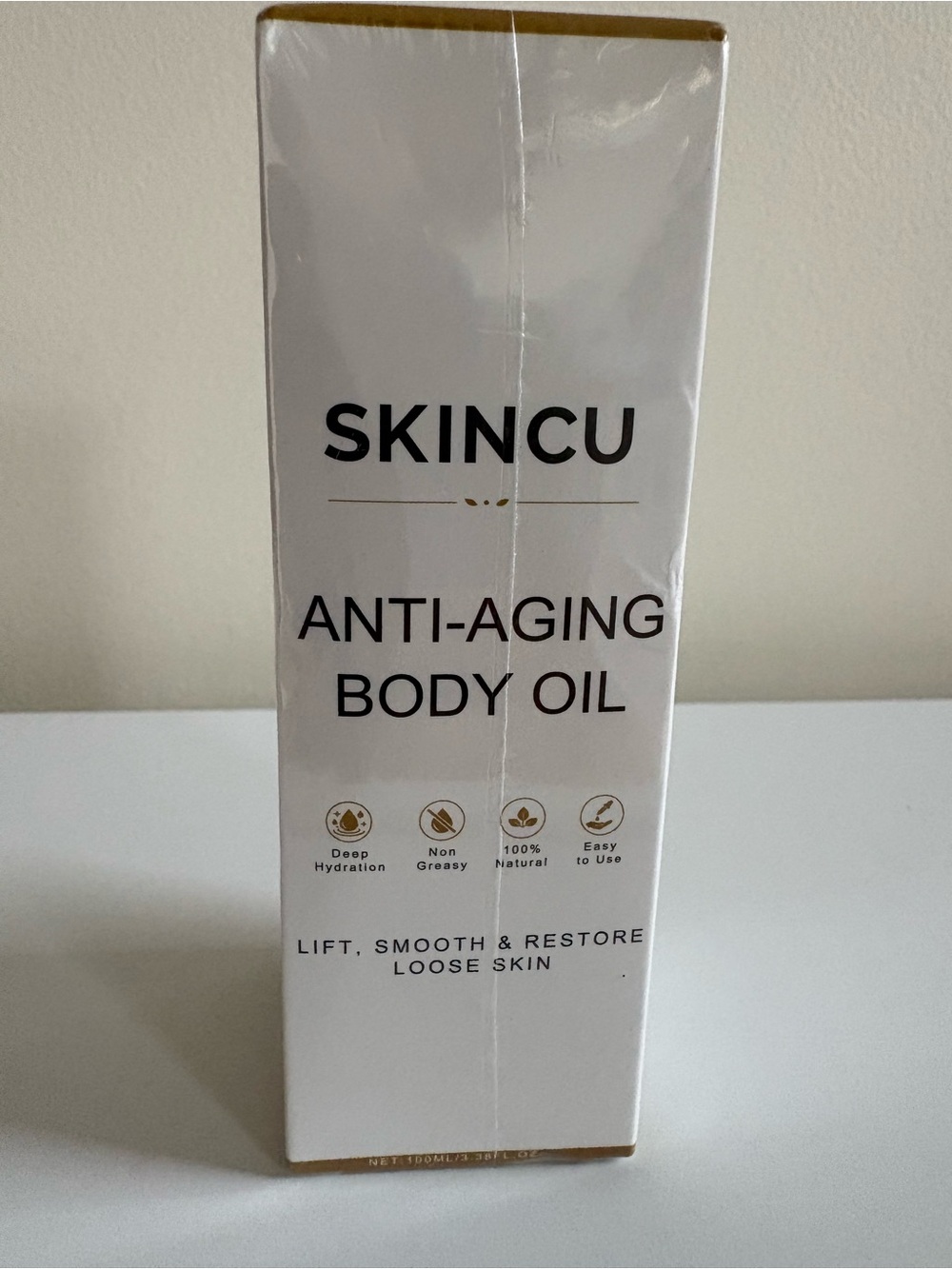 Skin Anti-Aging Body Oil – White with Gold Accents